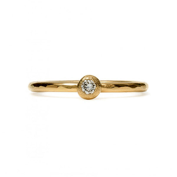 This unique contemporary engagement ring or stacking ring, has a single frosted gold orb, set with a beautiful sparkling diamond. This is a dainty engagement ring, in an elegant and minimalist design with a faceted band that reflects the light beautifully. A great choice for an alternative engagement ring.